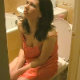 An attractive brunette girl blows some incredible, loud farts while sitting on a toilet. She may have pooped a little as well.